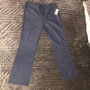 Dark blue button fly jean.